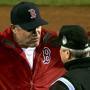 Red Sox manager John Farrell argued with an umpire after Dustin Pedroia was called out at second base in the first inning.